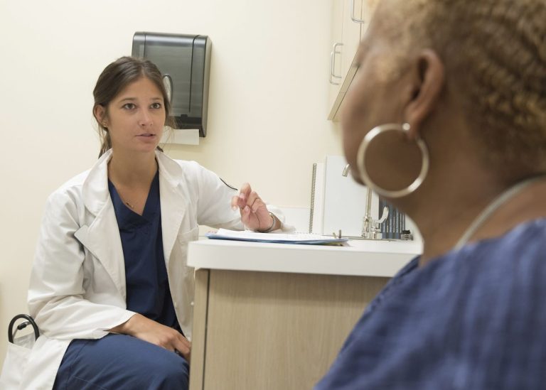 A doctor providing consult for a patient