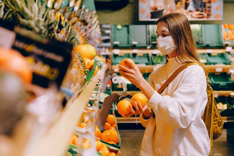 woman wearing mask in supermarket