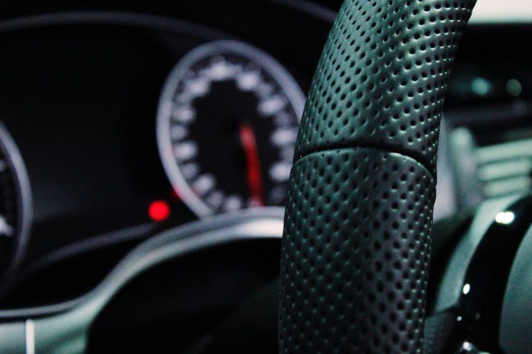 shallow depth of field photo of steering wheel