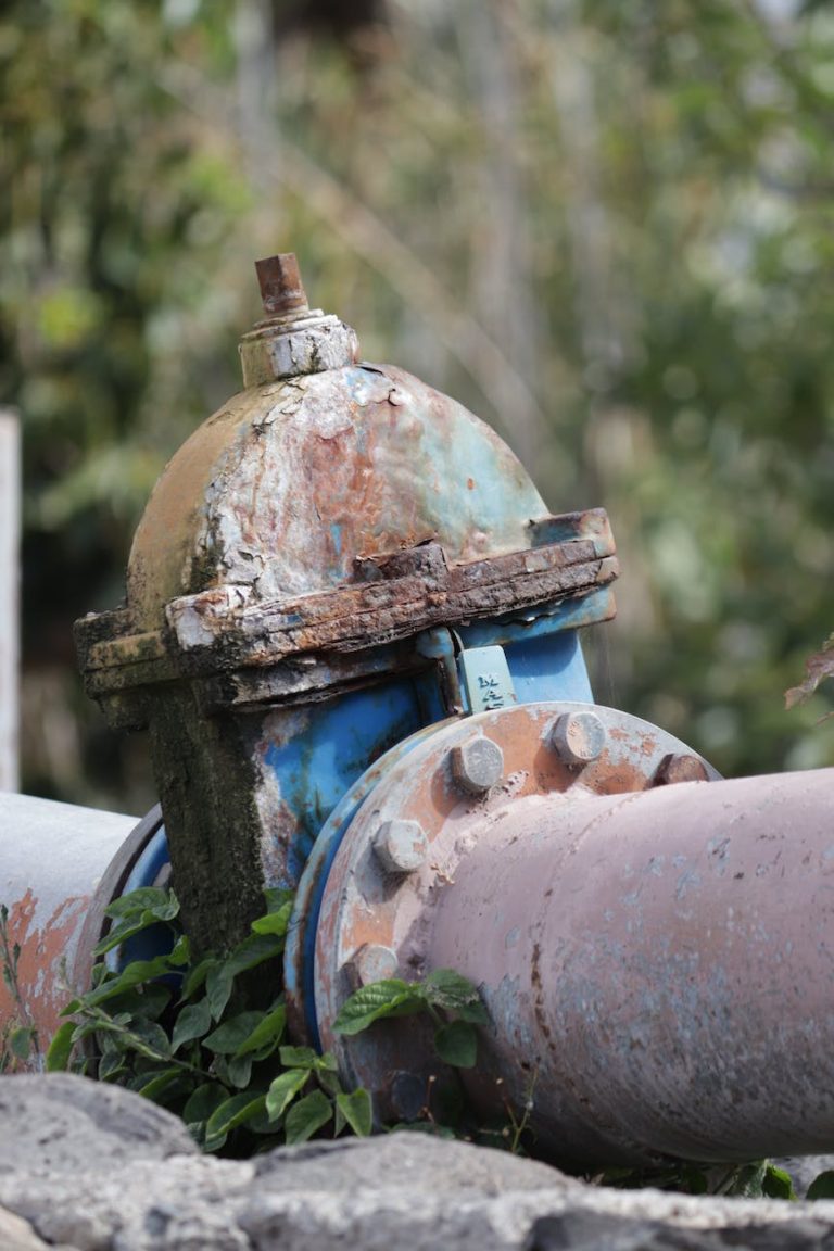 old rusty valve on a metal water pipe